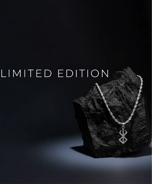 Berserk Necklace with a unique pendant on a dark rock, labeled 'Limited Edition' on a black background.