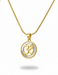 Gold necklace with a pendant featuring the Om symbol on a white background